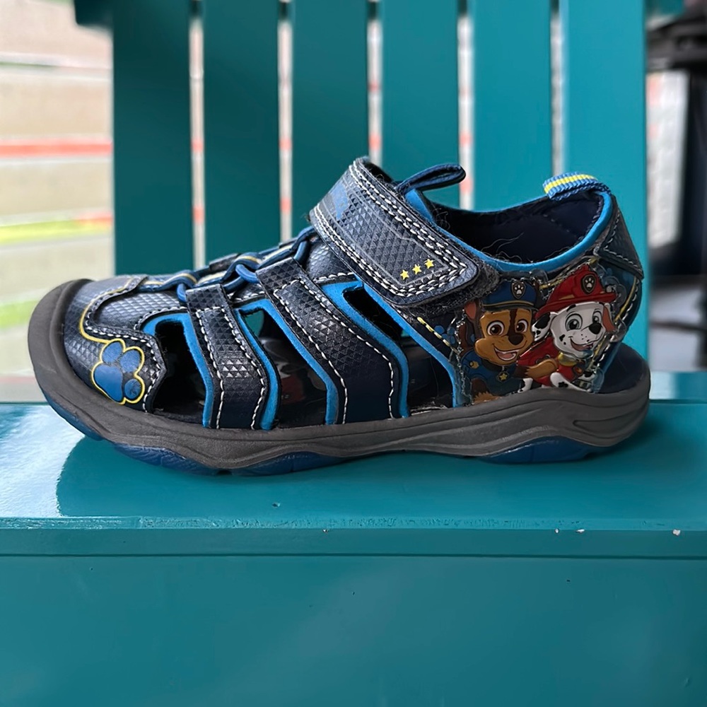 Toddler size 10 light up Paw Patrol sneakers.